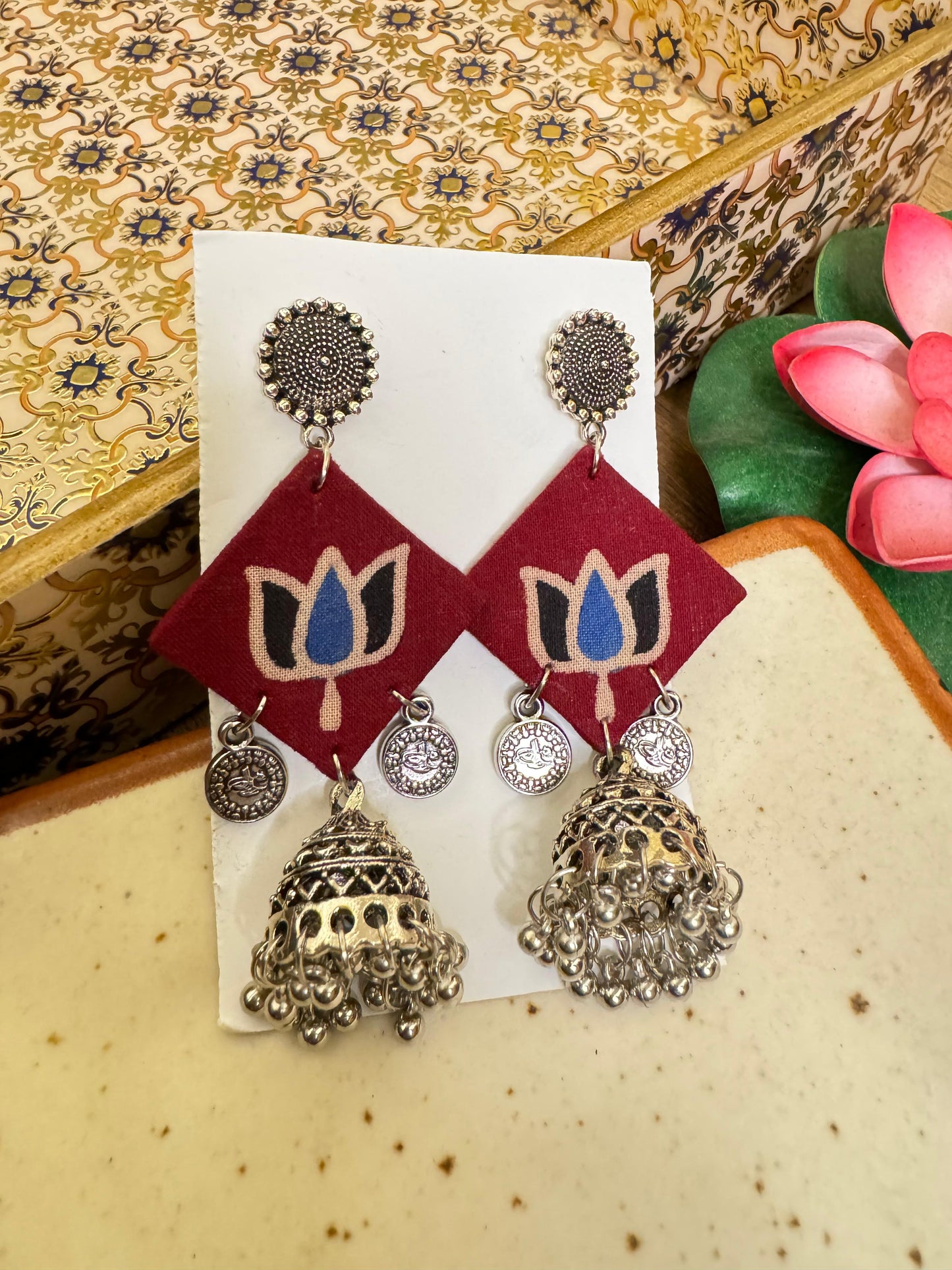 Maroon lotus jhumka earrings