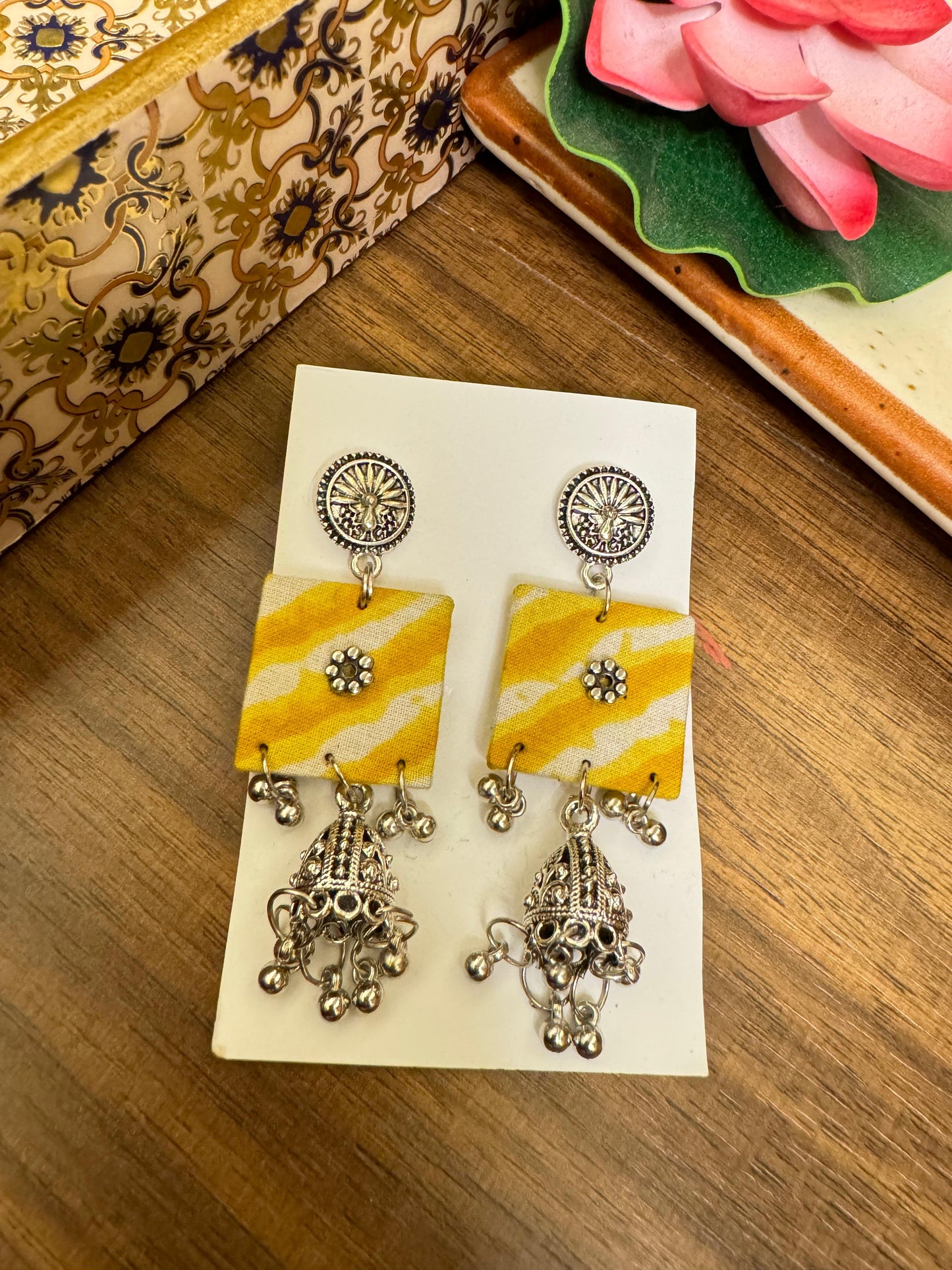 Yellow jhumka earrings