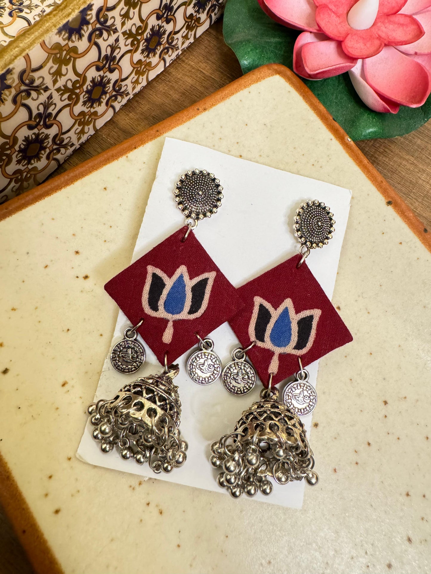 Maroon lotus jhumka earrings