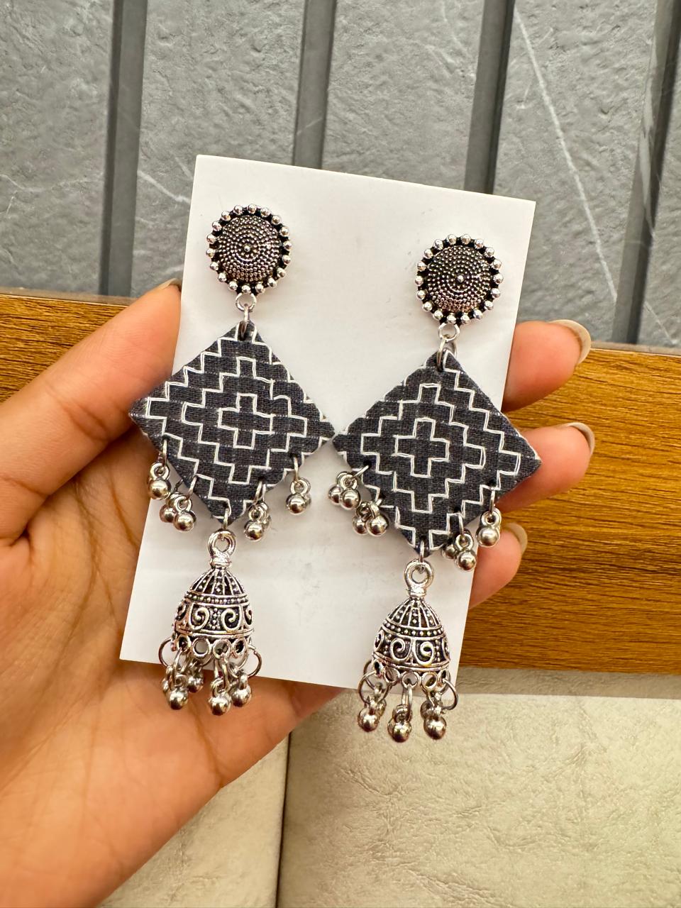 Grey embroidered earrings