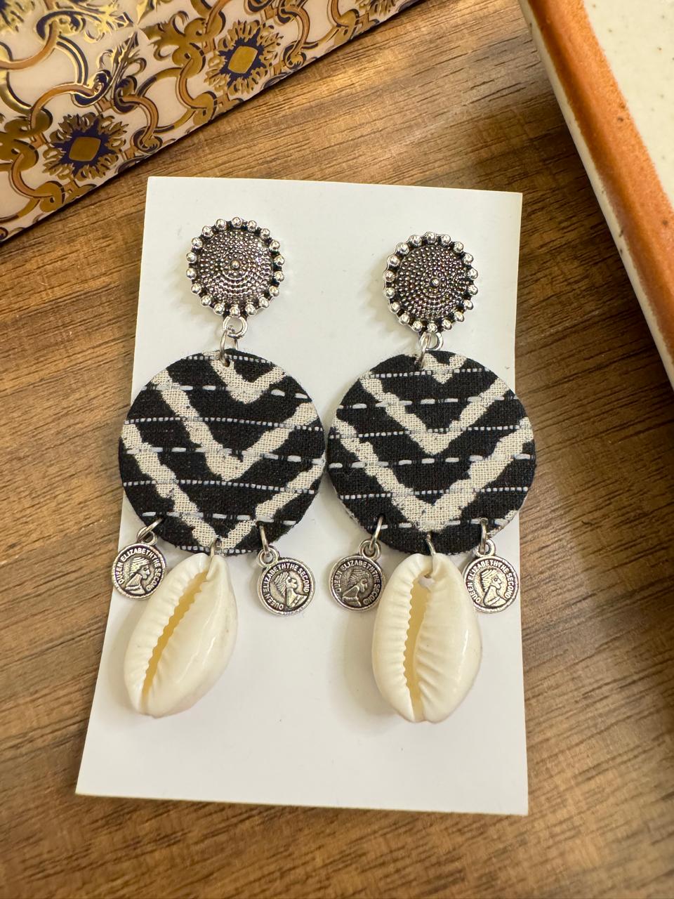 Black and white shell earrings